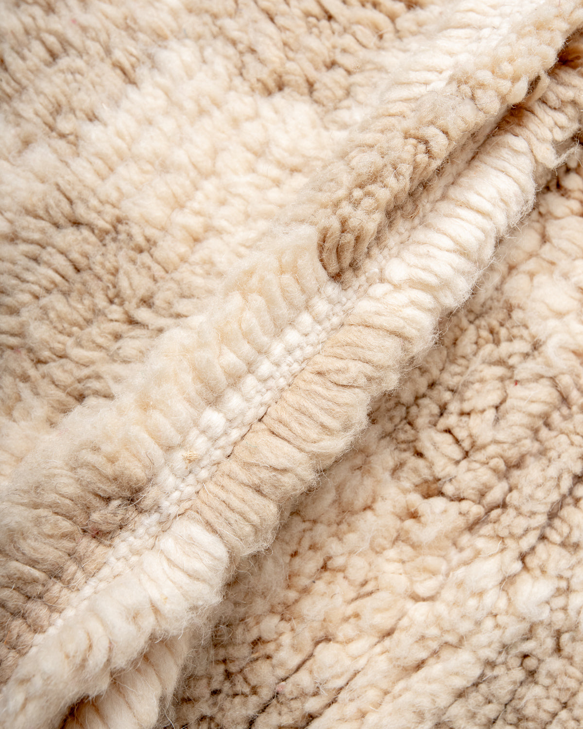 Modern, designer, handcrafted Berber rug from Morocco. Beniourain carpet with beautiful colours and patterns and fluffy wool texture.